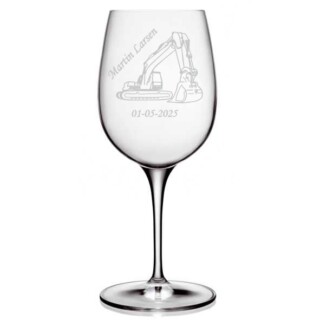 Vinglas med gravemaskine